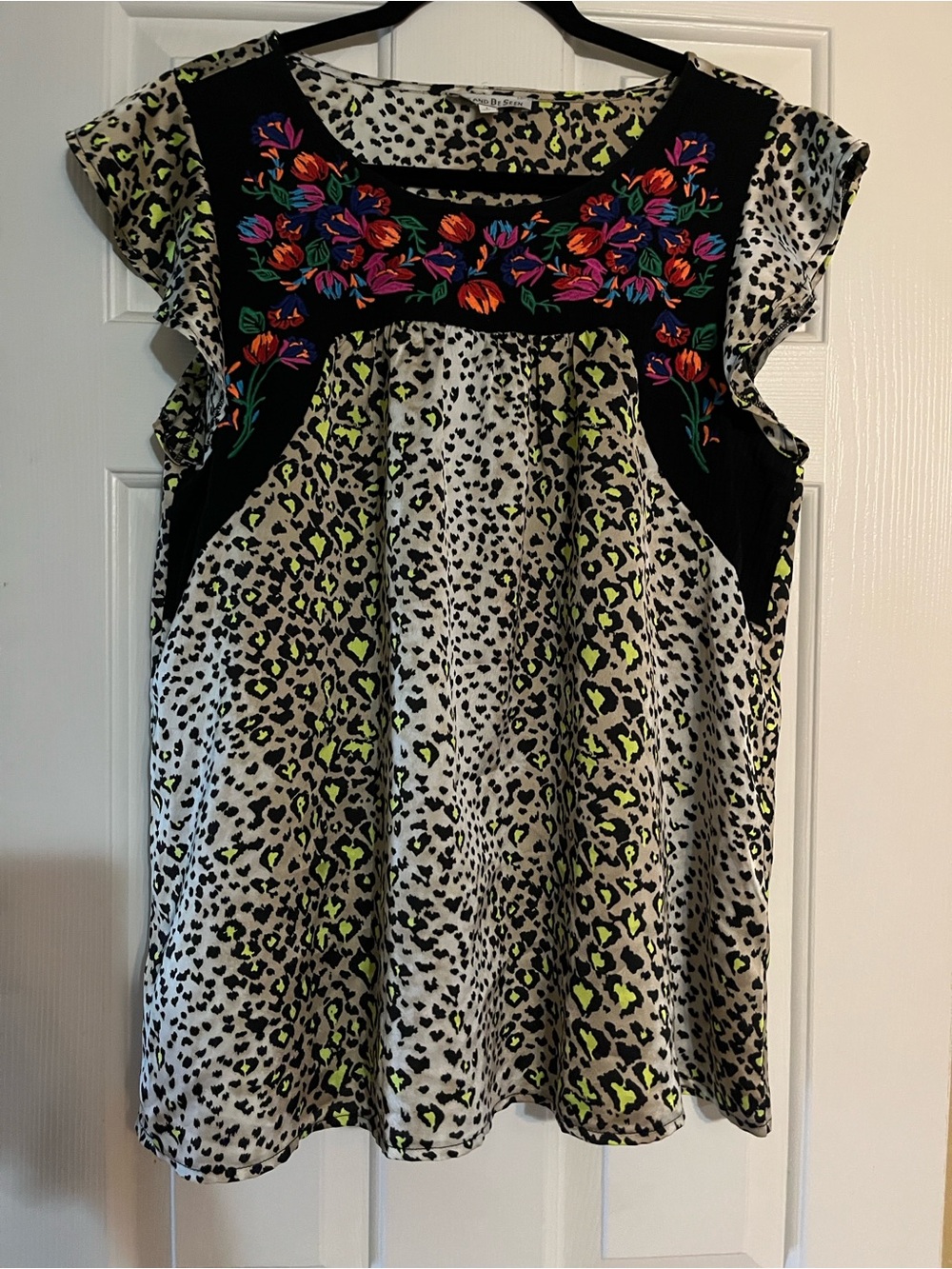 See and Be Seen with leopard & floral top.  In new condition.
